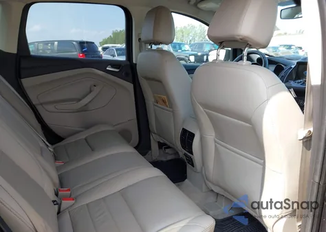 2016 Ford Escape Titanium z USA, uszkodzony, nr VIN 1FMCU9JX1GUC33014